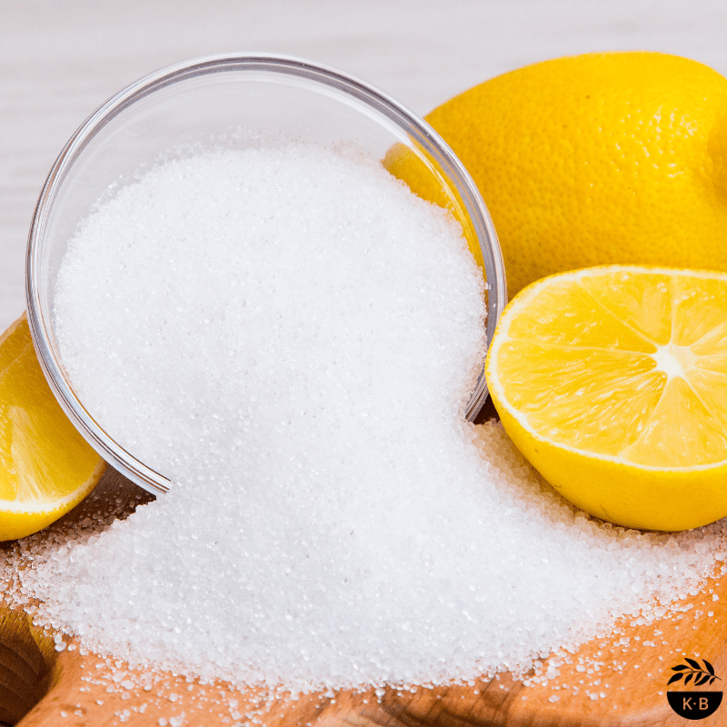 Citric Acid white crystals with lemon